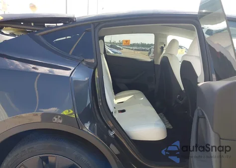 2025 Tesla Model Y Long Range Dual Motor All-Wheel Drive из США, поврежденный, VIN 7SAYGDED5SF321430